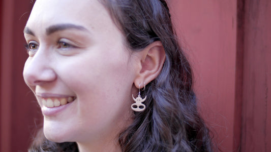 Silver cow earrings